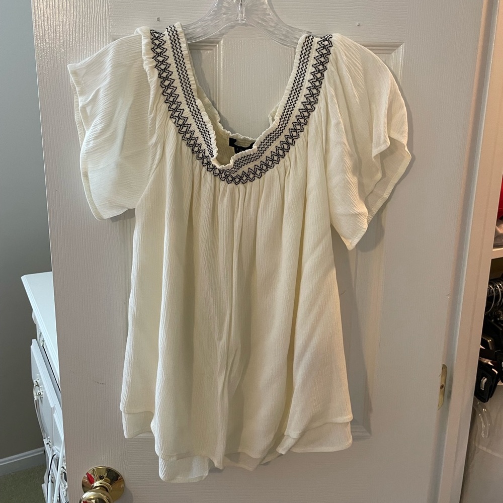 Cream off-the-shoulder blouse